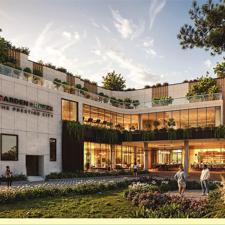 Prestige Garden Breeze clubhouse exterior at dusk
